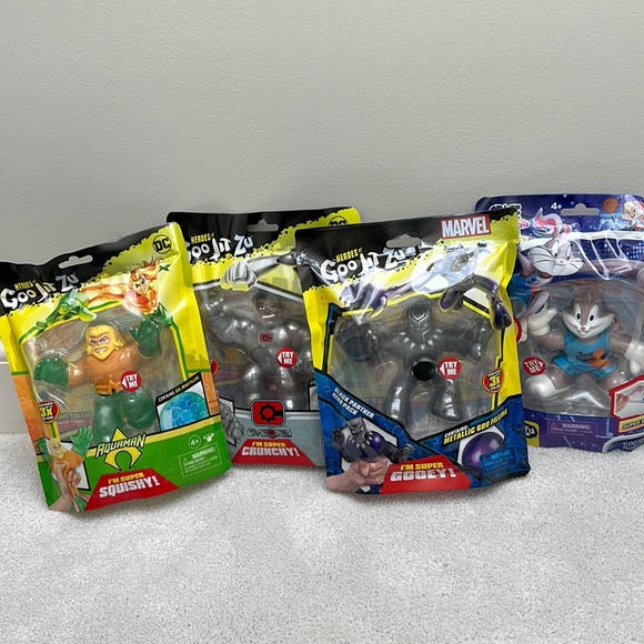 moose-toys-toys-lot-of-4-goo-jit-zu-super-stretch-toy-figure